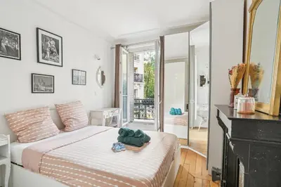 Un ou plusieurs lits dans un hébergement de l'établissement Magnifique appartement au cœur du XVIIIème