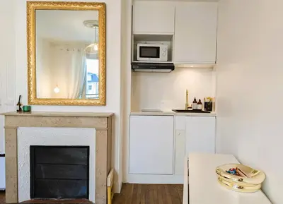 Cuisine ou kitchenette dans l'établissement Appart coquet avec vue - Alesia