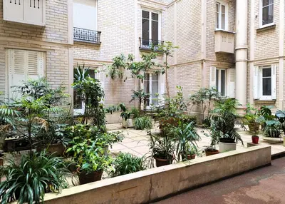 Jardin de l'établissement Appart coquet avec vue - Alesia