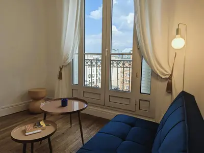 Coin salon dans l'établissement Appart coquet avec vue - Alesia