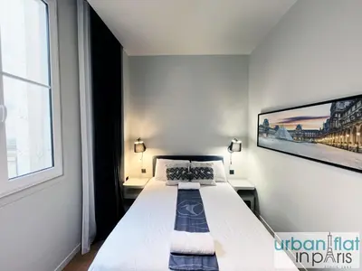 Un ou plusieurs lits dans un hébergement de l'établissement Urban Flat 110 - Luxury 3 Bedroom near Galeries Lafayette