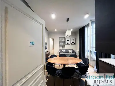 Coin salon dans l'établissement Urban Flat 110 - Luxury 3 Bedroom near Galeries Lafayette