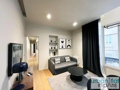Coin salon dans l'établissement Urban Flat 110 - Luxury 3 Bedroom near Galeries Lafayette