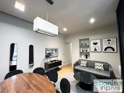Coin salon dans l'établissement Urban Flat 110 - Luxury 3 Bedroom near Galeries Lafayette