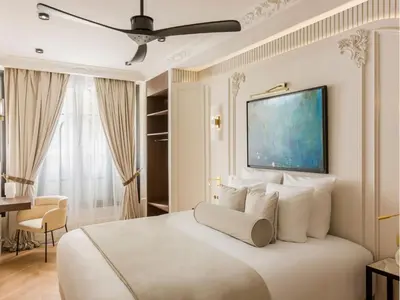 Un ou plusieurs lits dans un hébergement de l'établissement Merveil - Signature Suite -Tour Eiffel- Grenelle I