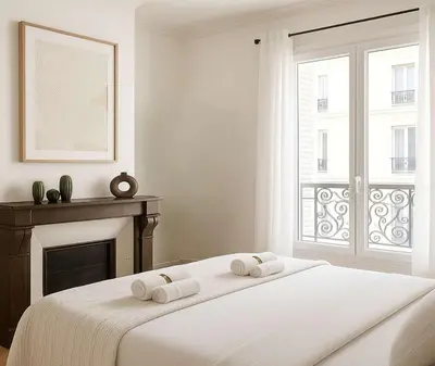 Un ou plusieurs lits dans un hébergement de l'établissement Arc de Triomphe - Premium apartment with lift for 6