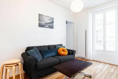 Coin salon dans l'établissement GuestReady - Charmant 2 pièces lumineux au calme