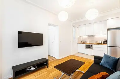 Cuisine ou kitchenette dans l'établissement GuestReady - Charmant 2 pièces lumineux au calme