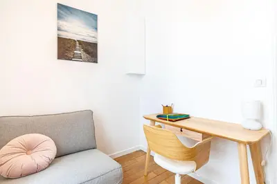 Coin salon dans l'établissement GuestReady - Charmant 2 pièces lumineux au calme