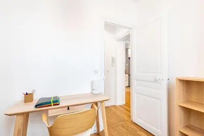 Cuisine ou kitchenette dans l'établissement GuestReady - Charmant 2 pièces lumineux au calme