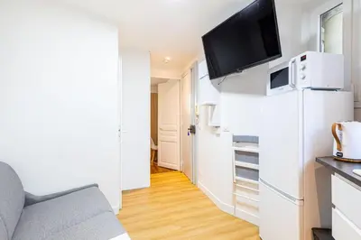 Cuisine ou kitchenette dans l'établissement GuestReady - Sérénité au Cœur de Paris