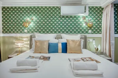 Un ou plusieurs lits dans un hébergement de l'établissement Elegant Triplex in Paris - Ideal for 10 - Aircon