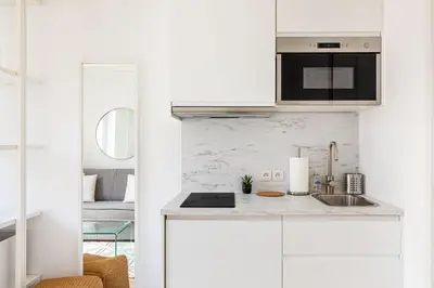 Cuisine ou kitchenette dans l'établissement GuestReady - Charmant studio lumineux à Paris