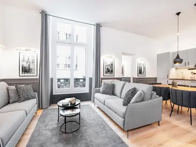 Coin salon dans l'établissement LivinParis - Luxury AC 3 Bedrooms Le Louvre I