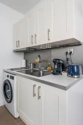 Cuisine ou kitchenette dans l'établissement Apart Merryland Paris Châtelet