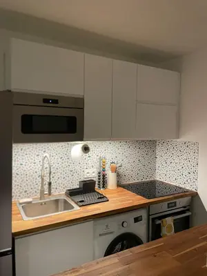Cuisine ou kitchenette dans l'établissement New & serene II 1 bedroom appartement near La Défense Paris Parking and Fibre