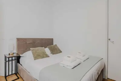 Un ou plusieurs lits dans un hébergement de l'établissement Charming apartment - 1BD-4P - Gare du Nord