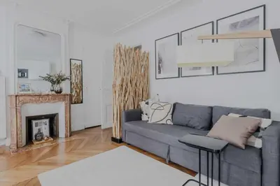 Coin salon dans l'établissement Charming apartment - 1BD-4P - Gare du Nord