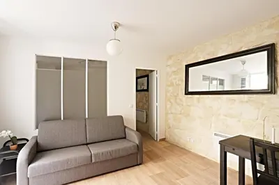 Coin salon dans l'établissement Appart Faubourg St Denis 4 personnes