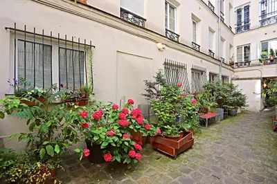 Jardin de l'établissement Appart Faubourg St Denis 4 personnes
