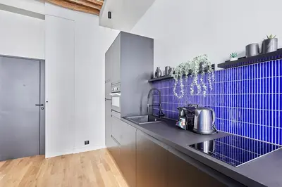 Cuisine ou kitchenette dans l'établissement Charming apartment 1 bedroom by Studio Prestige