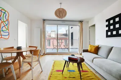 Coin salon dans l'établissement Pick A Flat's Apartments with Terrace in Clichy - Boulevard Jean-Jaures