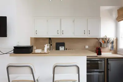 Cuisine ou kitchenette dans l'établissement High standing Studio Paris 17