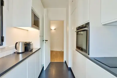 Cuisine ou kitchenette dans l'établissement Splendid Apartment in the Heart of the Chic 16th