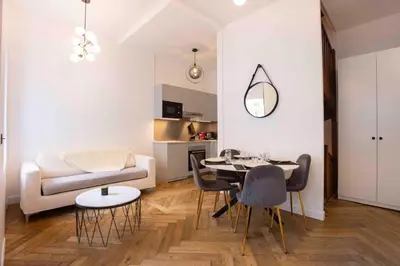 Coin salon dans l'établissement DUPLEX AU COEUR DU 16 Eme