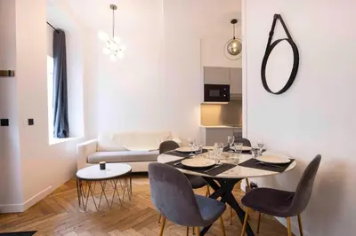 Coin salon dans l'établissement DUPLEX AU COEUR DU 16 Eme