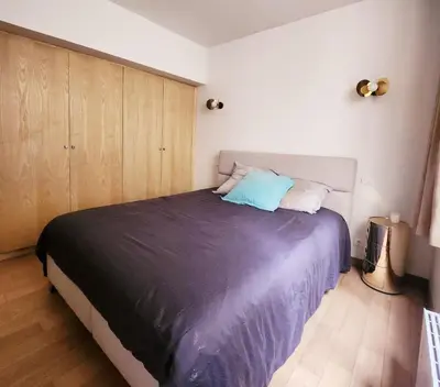Un ou plusieurs lits dans un hébergement de l'établissement Homeloveparis