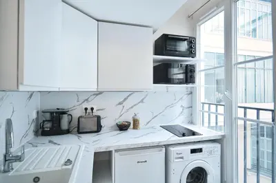 Cuisine ou kitchenette dans l'établissement L'appartement du duc de Choiseul - Coeur Opéra
