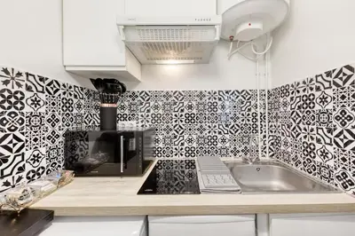 Cuisine ou kitchenette dans l'établissement Studio Saint Denis stade de France