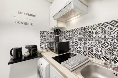 Cuisine ou kitchenette dans l'établissement Studio Saint Denis stade de France
