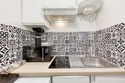 Cuisine ou kitchenette dans l'établissement Studio Saint Denis stade de France