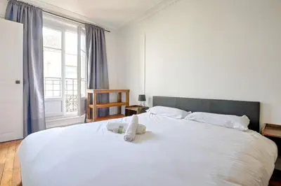 Un ou plusieurs lits dans un hébergement de l'établissement Appartement Lucent - Welkeys
