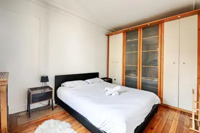 Un ou plusieurs lits dans un hébergement de l'établissement Appartement Lucent - Welkeys