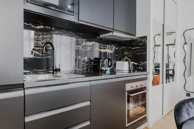 Cuisine ou kitchenette dans l'établissement Elegant apartment - 1BD-2P - Panthéon