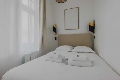 Un ou plusieurs lits dans un hébergement de l'établissement Elegant apartment - 1BD-2P - Panthéon