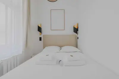 Un ou plusieurs lits dans un hébergement de l'établissement Elegant apartment - 1BD-2P - Panthéon