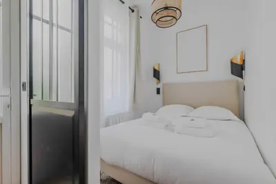 Un ou plusieurs lits dans un hébergement de l'établissement Elegant apartment - 1BD-2P - Panthéon