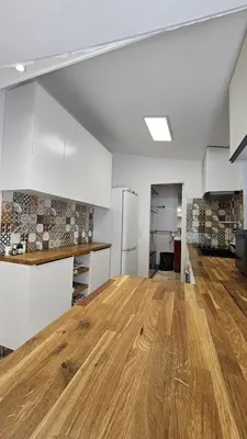Cuisine ou kitchenette dans l'établissement Appartement Boulogne-Billancourt