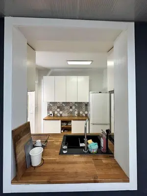 Cuisine ou kitchenette dans l'établissement Appartement Boulogne-Billancourt