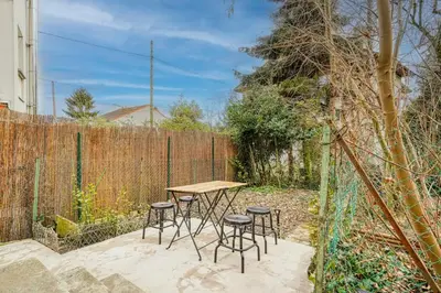 Jardin de l'établissement Maison au calme pour 4 pers avec parking a 5 min du métro L7