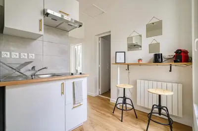 Cuisine ou kitchenette dans l'établissement Maison au calme pour 4 pers avec parking a 5 min du métro L7