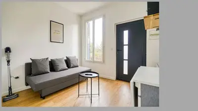 Coin salon dans l'établissement Maison au calme pour 4 pers avec parking a 5 min du métro L7