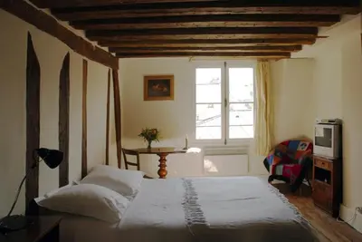 Un ou plusieurs lits dans un hébergement de l'établissement Nest in Paris