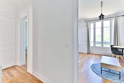 Coin salon dans l'établissement Magnifique et spacieux appartement proche Paris