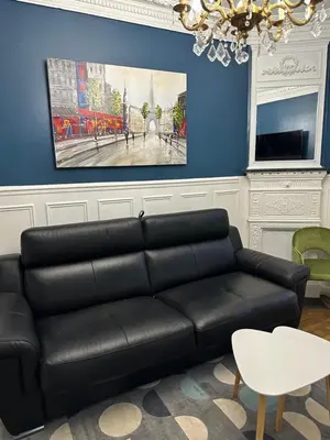 Coin salon dans l'établissement Appartement calme près de La Villette