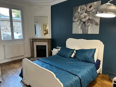 Un ou plusieurs lits dans un hébergement de l'établissement Appartement calme près de La Villette